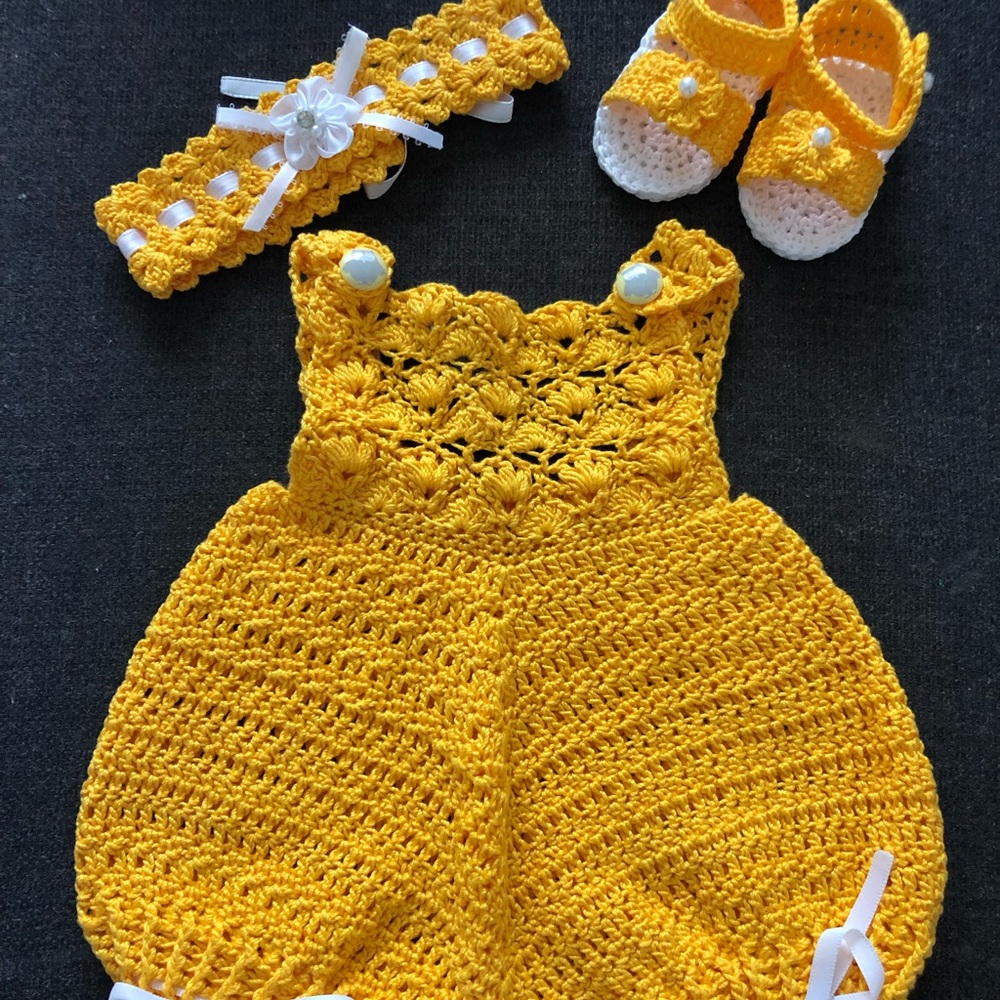 Newborn baby girl crochet romper.